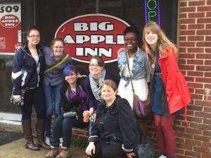 Angela Jill Cooley with Minnesota State Mankato students at the Big Apple Inn in Jackson, Mississippi, home of the pig ear sandwich.